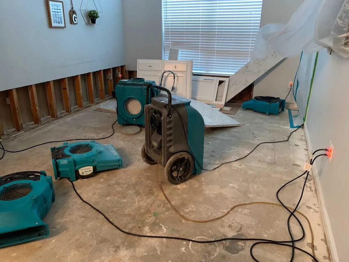 Dehumidifier in flood-cut room for Water Damage Restoration in Winter Garden
